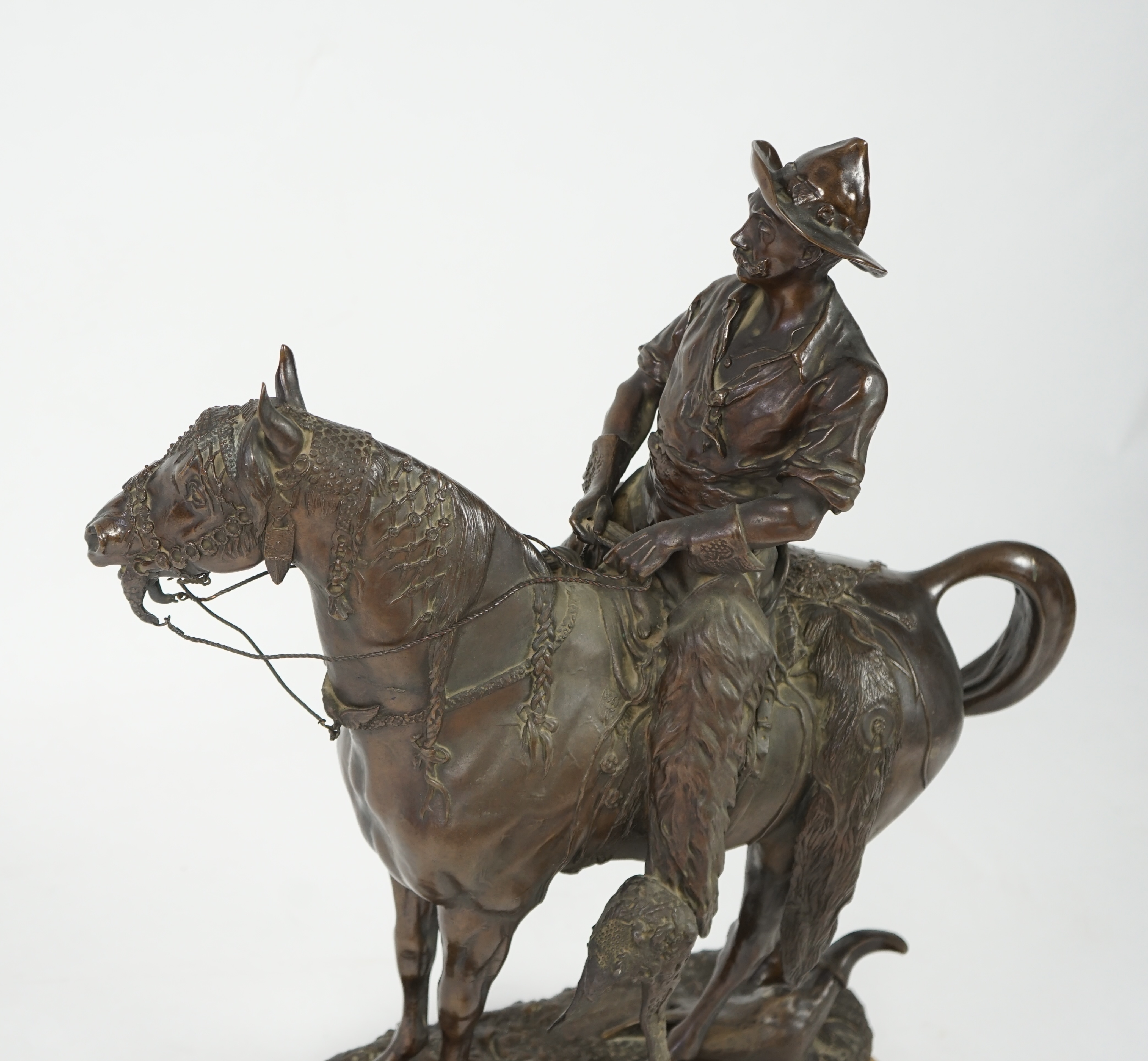 Walter Winans (St. Petersburg, 1852-Parsloe Park, Essex, 1920), a cast bronze of the artist, as a cowboy, riding the Arab stallion Skowronek, 50cm wide, 66cm high, overall 79.5cm high